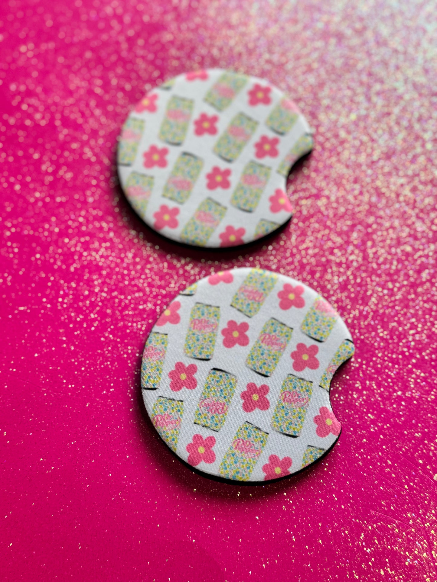 Pink flowers and dr.pep car coasters