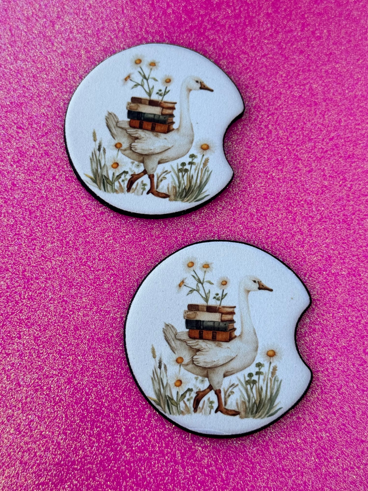 Goose and books car coasters